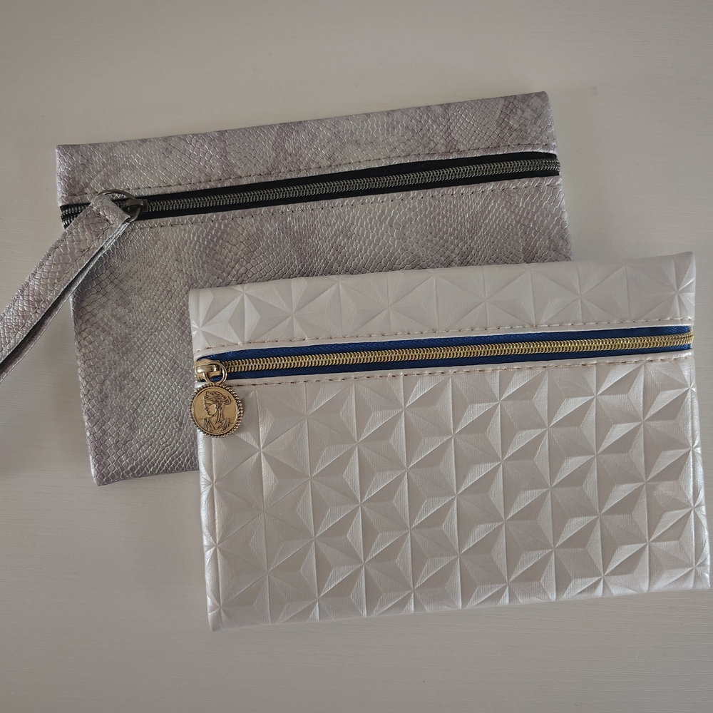 Ipsy Silver and White Cosmetic Bags